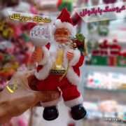 خرید عمده عروسک بابانوئل مشعل دار متحرک موزیکال چراغدار فروش عمده لوازم کریسمس